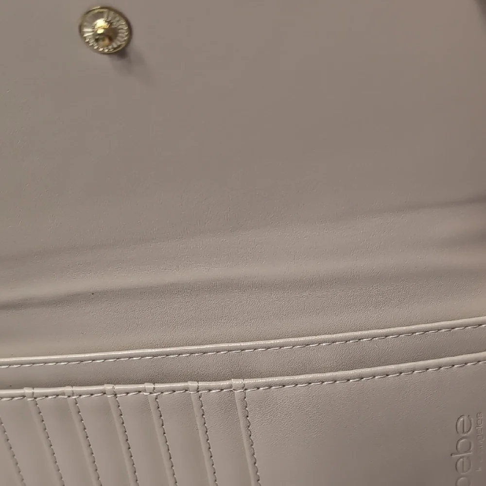 bebe Tan Quilted Clutch Wristlet